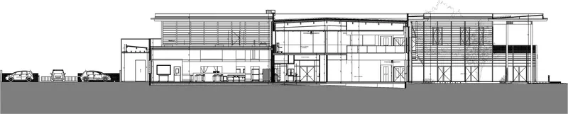 Section drawing illustrating a two-story interior with exposed structure and horizontal timber screening elements