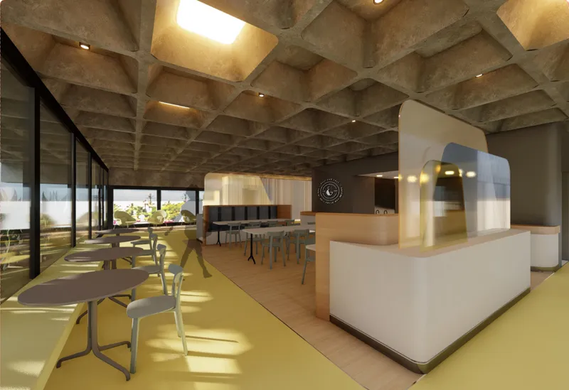 A bright student café and social hub with warm finishes, flexible seating, glass partitions, and ceiling skylights.