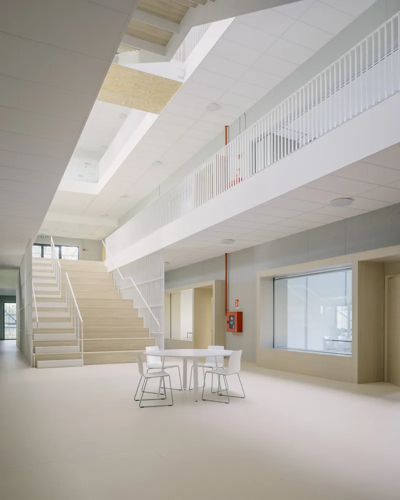 The triple-height atrium at the heart of the school. Photo © Aldo Amoretti