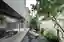 MOZHAO ARCHITECTS Carves Courtyards and Koi Ponds into a Dense Shenzhen Village House