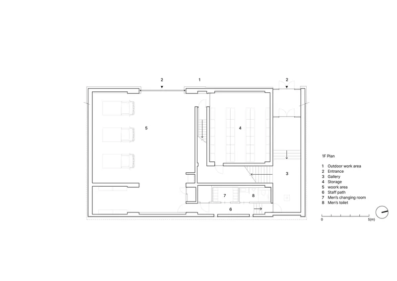 First floor plan drawing showing central stair, gallery space, storage and outdoor work area