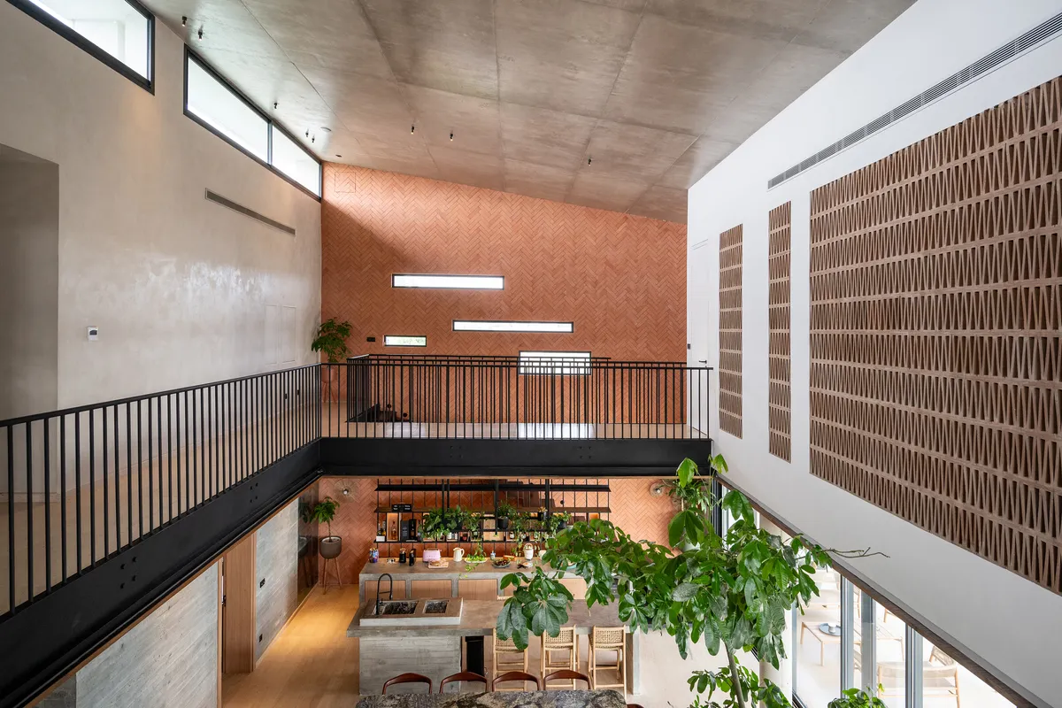 Atelier130 Builds a Villa in Abidjan with a Skate Bowl, Infinity Pool, and a Double-Height Void at Its Core