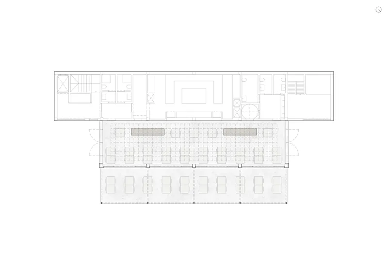 Floor plan drawing showing an elongated rectangular structure with a central colonnade and outdoor terrace