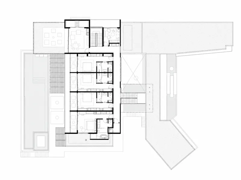 Upper floor plan drawing showing bedroom suites arranged along a corridor with outdoor terrace