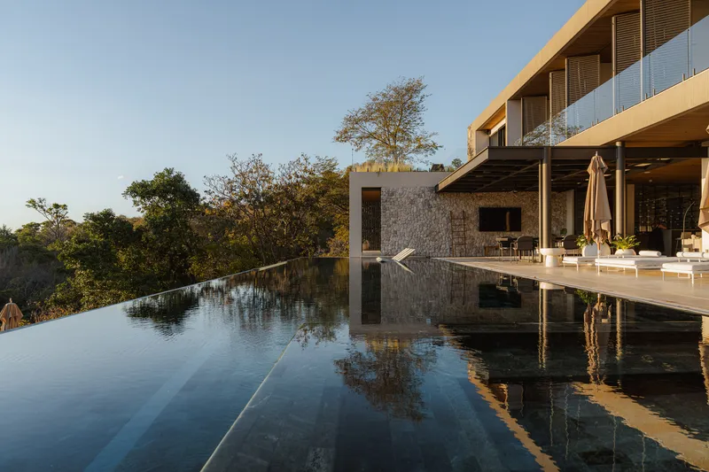 Inverse Project Terraces a 1,600 m² House Down a Costa Rican Hillside Instead of Crowning It