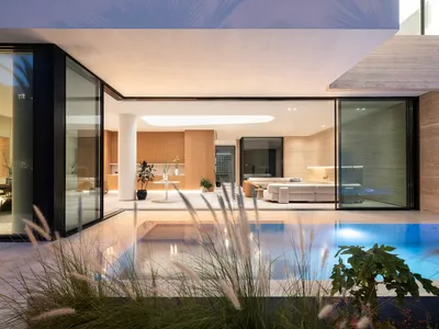 Alhumaidhi Architects Builds a Kuwaiti Home Around a Central Void That Pulls Light Through Every Floor