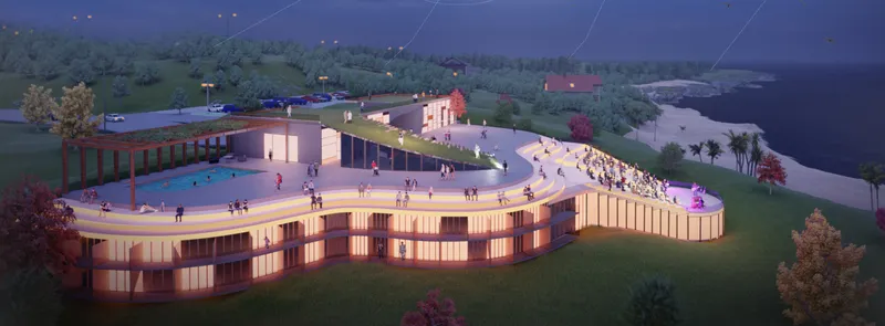 Night view of the musical retreat blending green roofs, public terraces, and coastal landscape