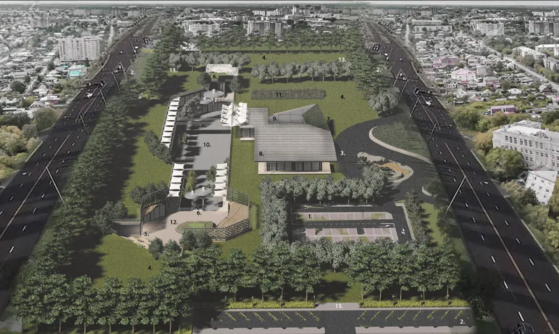 Aerial masterplan showing the open-air shopping centre integrated with parkland, public spaces, parking, and urban connections.