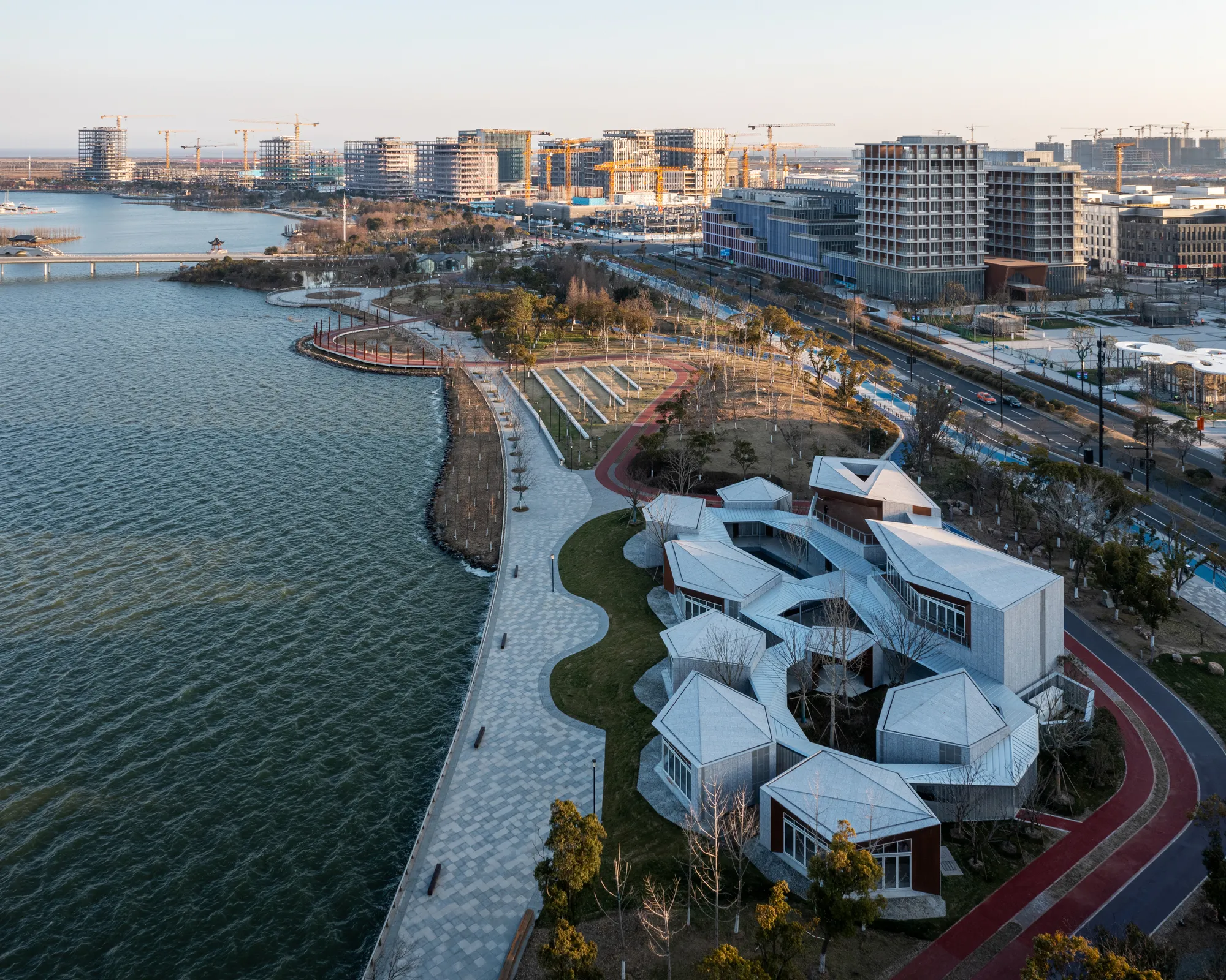 Atelier Z+ Scatters Poetry-Inspired Pavilions Along a Shanghai Lakefront