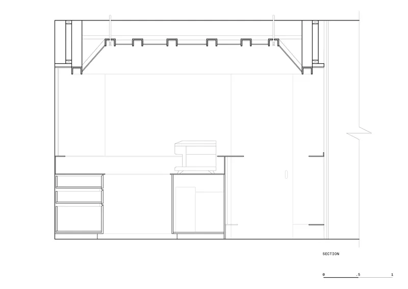 Section drawing showing the interior with exposed timber ceiling beams and central kitchen island