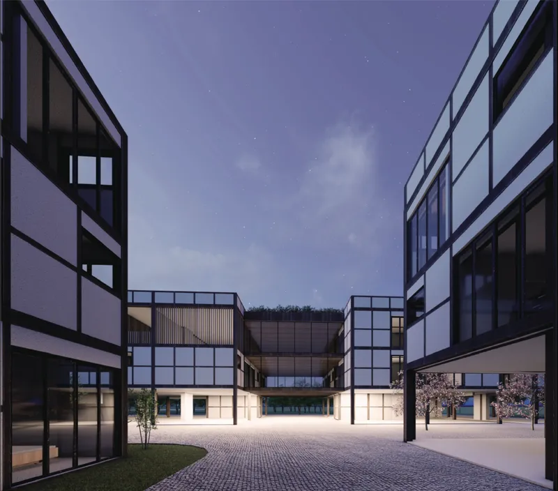 Night view of the central courtyard, where shared open space strengthens community life within the recovery housing cluster.