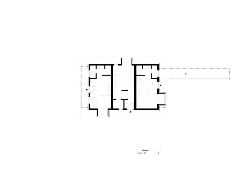 Floor plan drawing of a symmetrical layout with flanking rooms and central circulation core