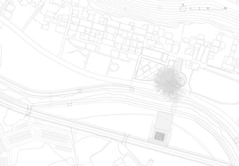 Site plan drawing showing the building footprint within the surrounding street grid and topography