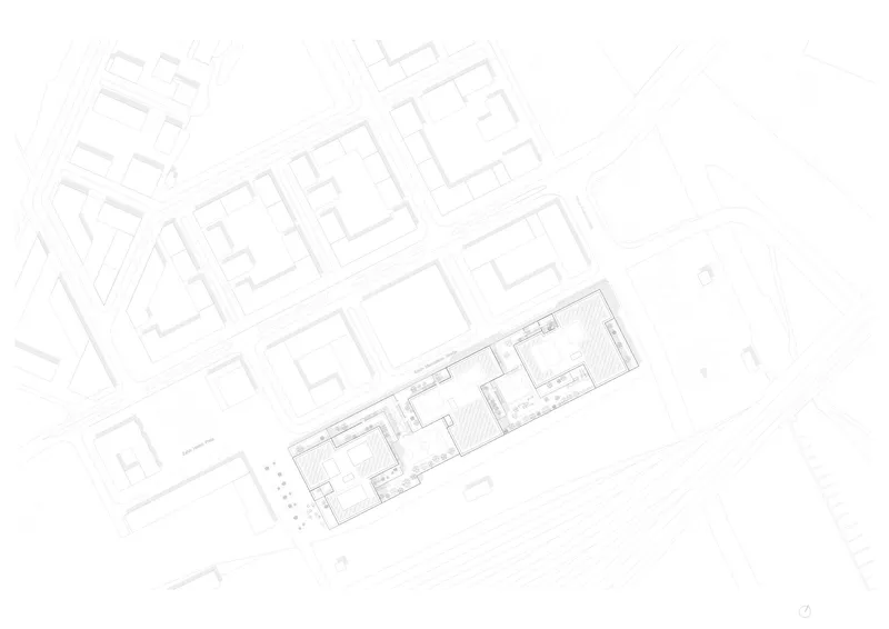 Site plan drawing showing the building footprint within the surrounding urban blocks and streets