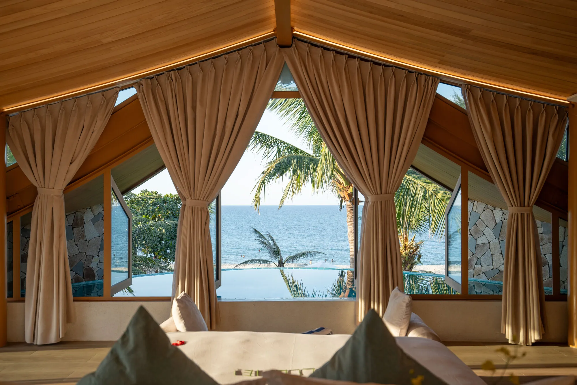 85 Design Shapes a Coastal Villa in Hoi An Around the Arc of a Seagull's Wing