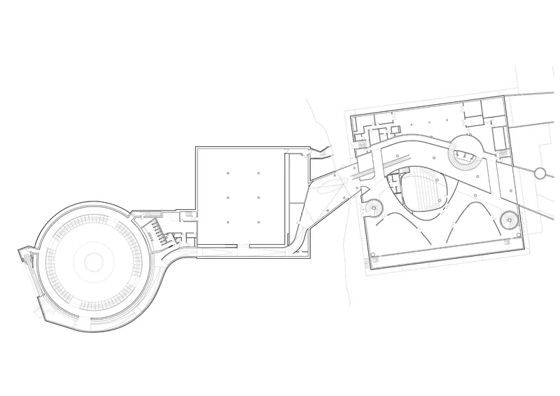 Floor plan drawing showing circular theater volume connected to rectangular gallery spaces and landscaped exterior courts