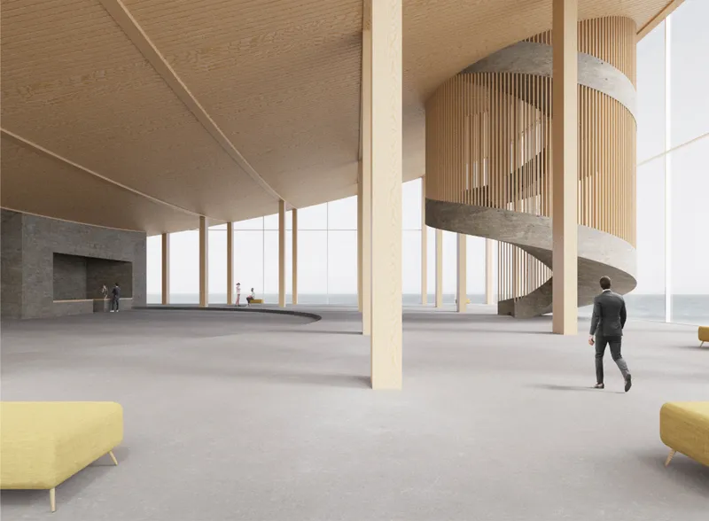 Interior foyer with cylindrical timber-slatted staircase and full-height glazing overlooking the sea