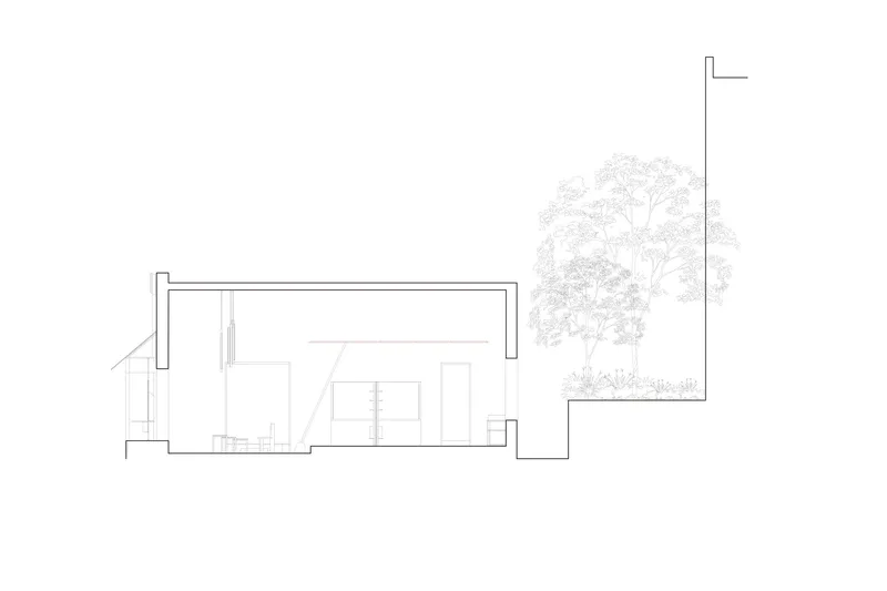 Section drawing revealing the interior volumes with built-in furniture and courtyard greenery