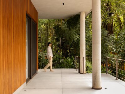 Carlos Alberto Arquitetura Floats a Timber and Concrete Suite Above a Tropical Lagoon Landscape