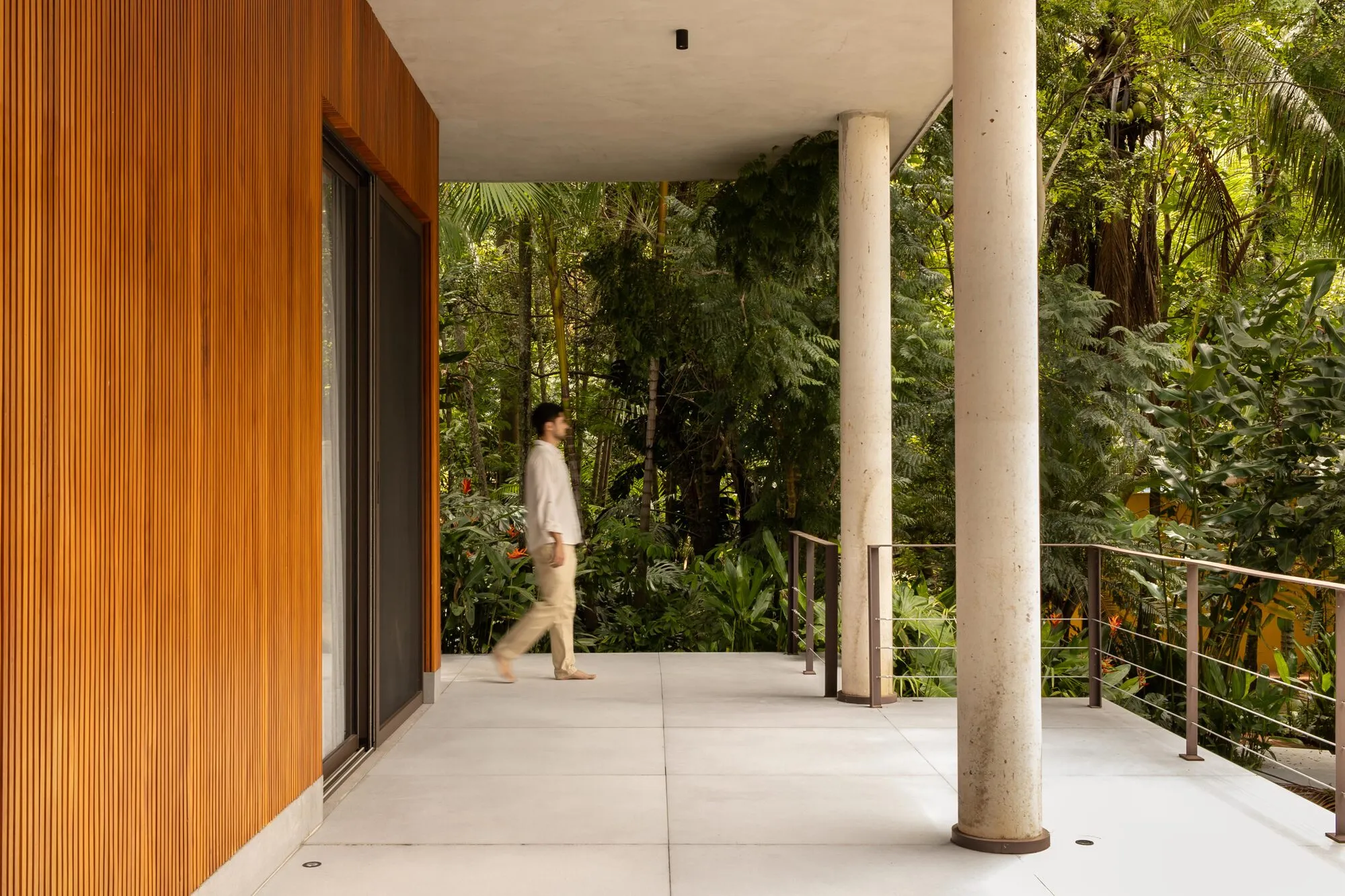 Carlos Alberto Arquitetura Floats a Timber and Concrete Suite Above a Tropical Lagoon Landscape