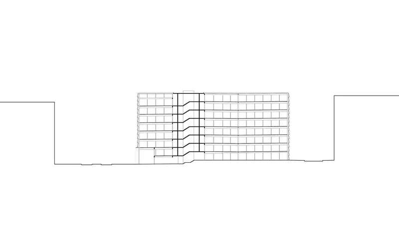 Elevation drawing displaying a gridded facade with recessed central entrance and adjacent low structure