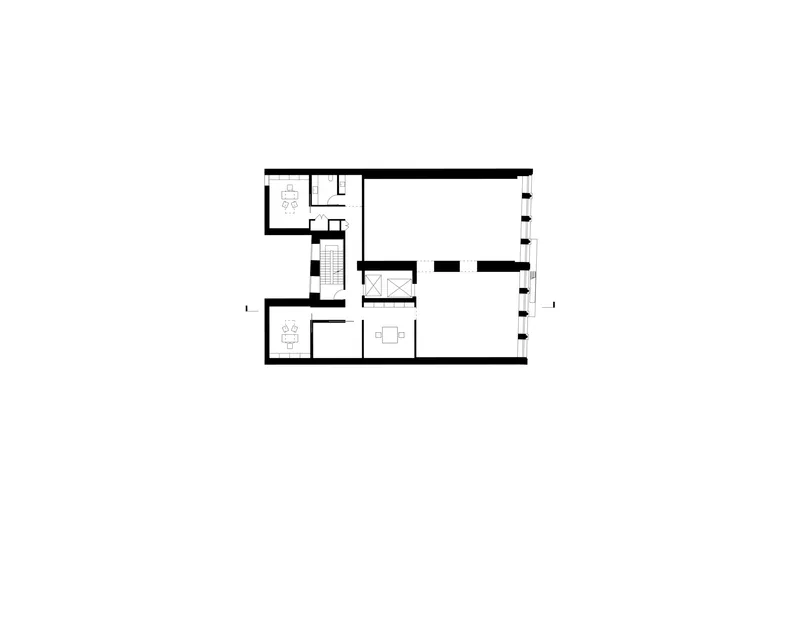 Floor plan drawing showing residential spaces with kitchen, dining area, and stair adjacent to terrace