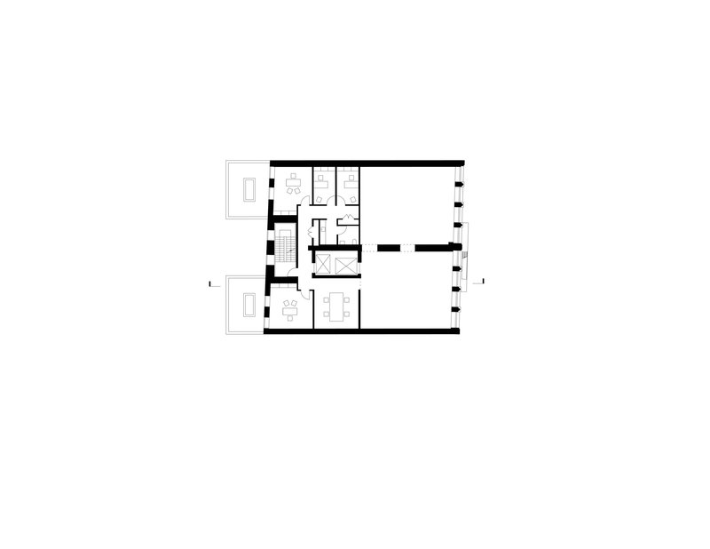 Floor plan drawing showing living spaces with two outdoor terraces flanking the main volume
