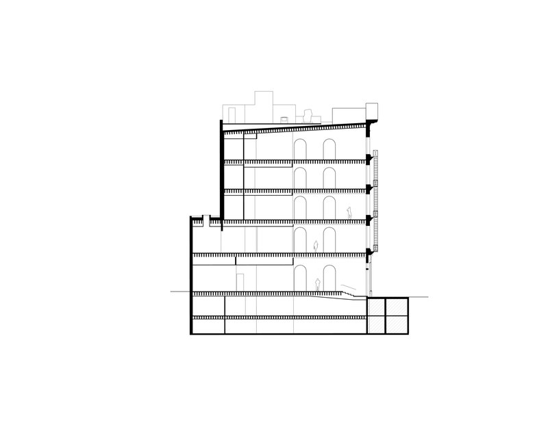 Section drawing revealing multiple floor levels with arched openings and basement spaces