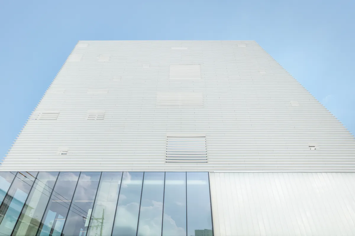 NOTNOT Architects Wraps a Seoul Cultural Hub in a Rhythmic White Louver Skin