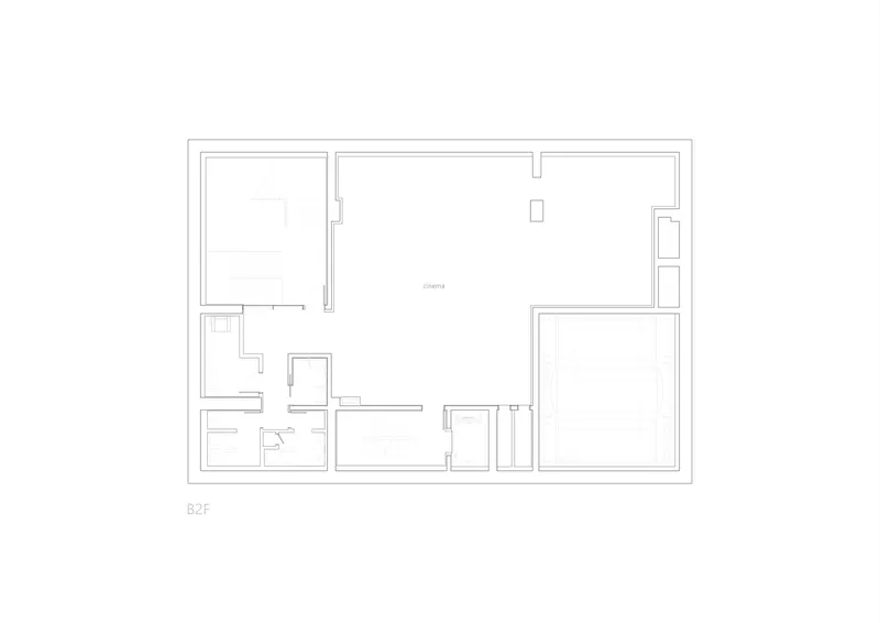 Second basement floor plan with rooms arranged around a central cinema space