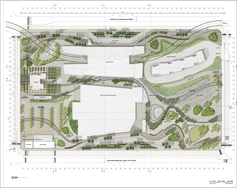 Site plan drawing showing the building footprint surrounded by curving roadways and landscaped zones