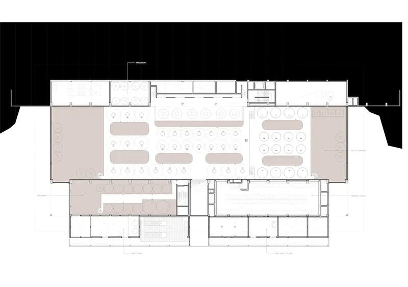 Floor plan drawing depicting dining zones with curved booth seating and scattered table layouts