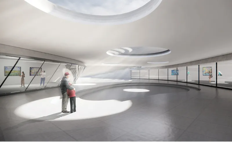 A light-filled sunken courtyard creates a calm transition between exhibition and public spaces.