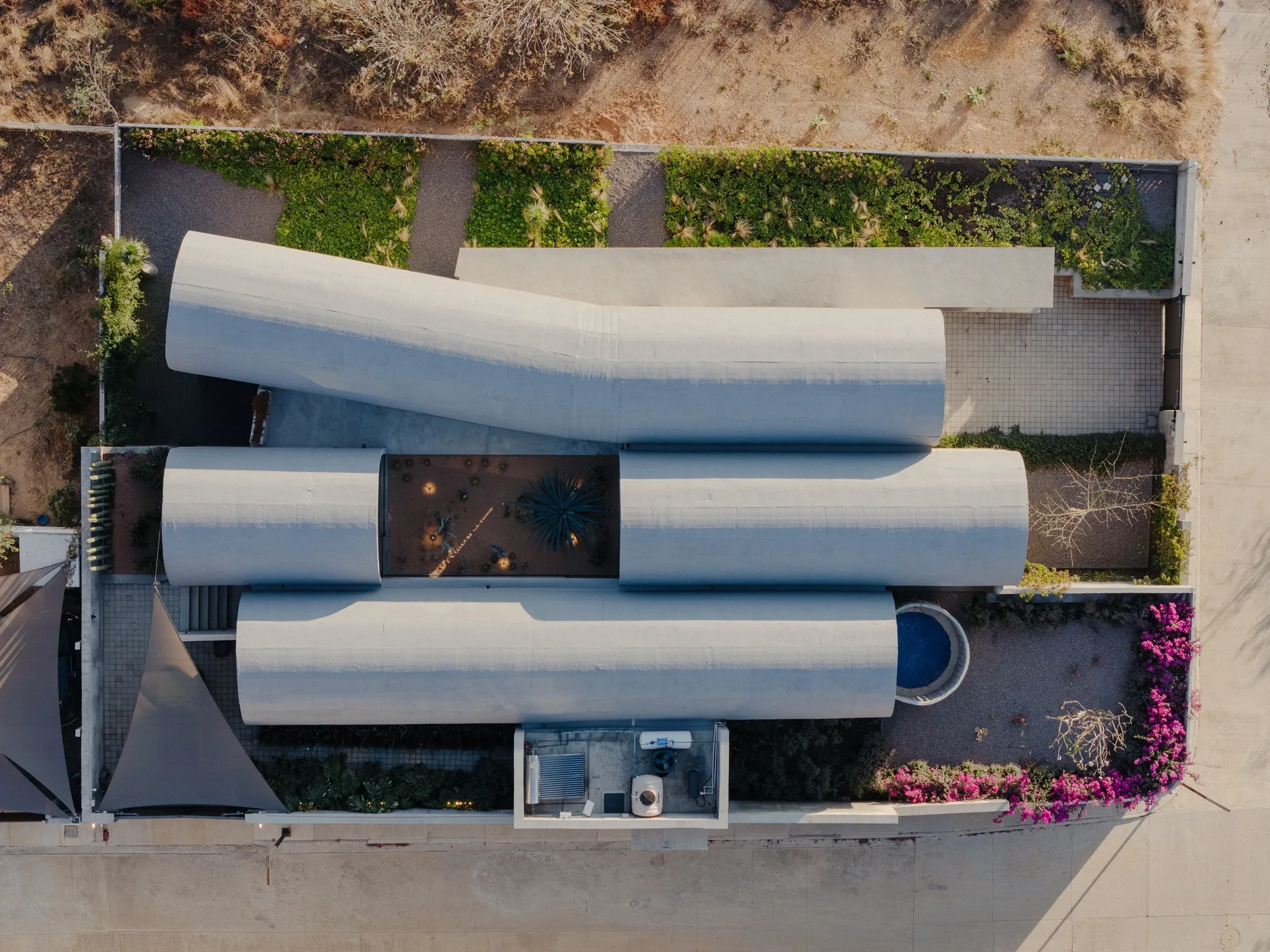 NV/design Architecture Builds a Board-Formed Concrete Home of Barrel Vaults in Oaxaca for Themselves