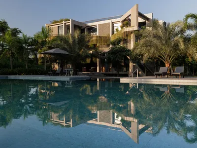 Reincarnation Weaves a Three-Story Retreat into the Green Landscape of Rural Bangladesh