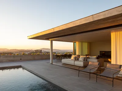 L2C Arquitetura Terraces a Concrete House Down a Steep Braga Hillside