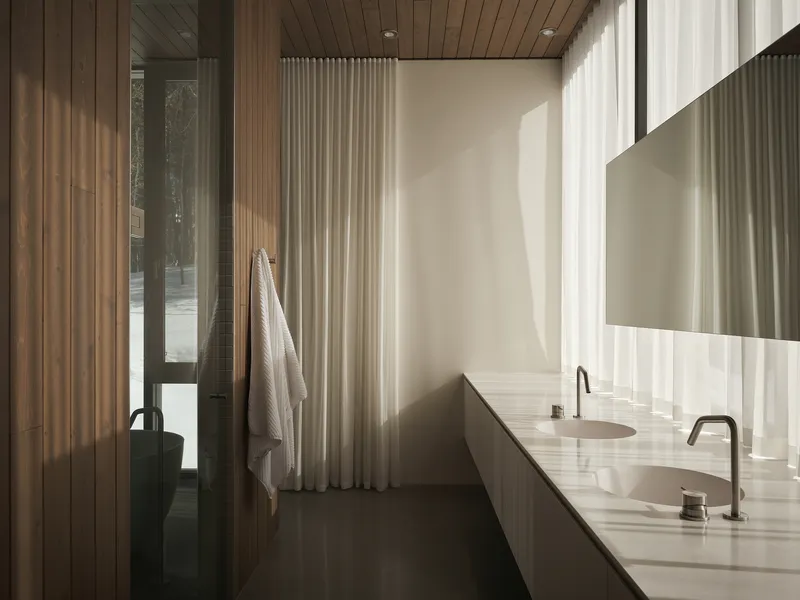Bathroom with double vanity and vertical timber cladding softly lit through translucent curtains
