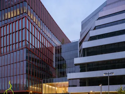 Studio Gang and Henning Larsen Turn a Boston Rail Yard into a Life Science Campus of Two Voices