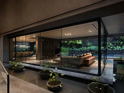 Wahana Architects Splits a Jakarta House in Two and Fills the Gap with Water
