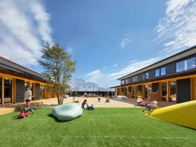 Nikken Sekkei Wraps a Hospital Nursery in Orange Roof Tiles to Honor Kurashiki's Streetscape