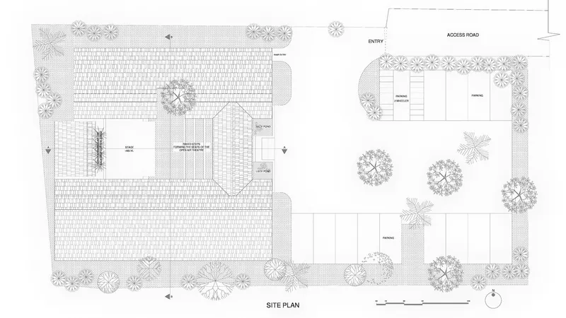 Site plan drawing showing two building volumes surrounded by landscaping and tree canopies