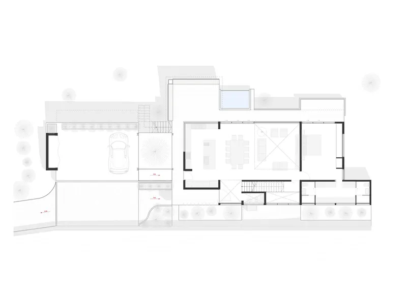 Ground floor plan showing a carport, entry sequence, and open living spaces with a spiral stair