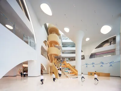 Perkins&Will Arranges a Shenzhen School in Triangular Clover Modules on a Waterfront Campus