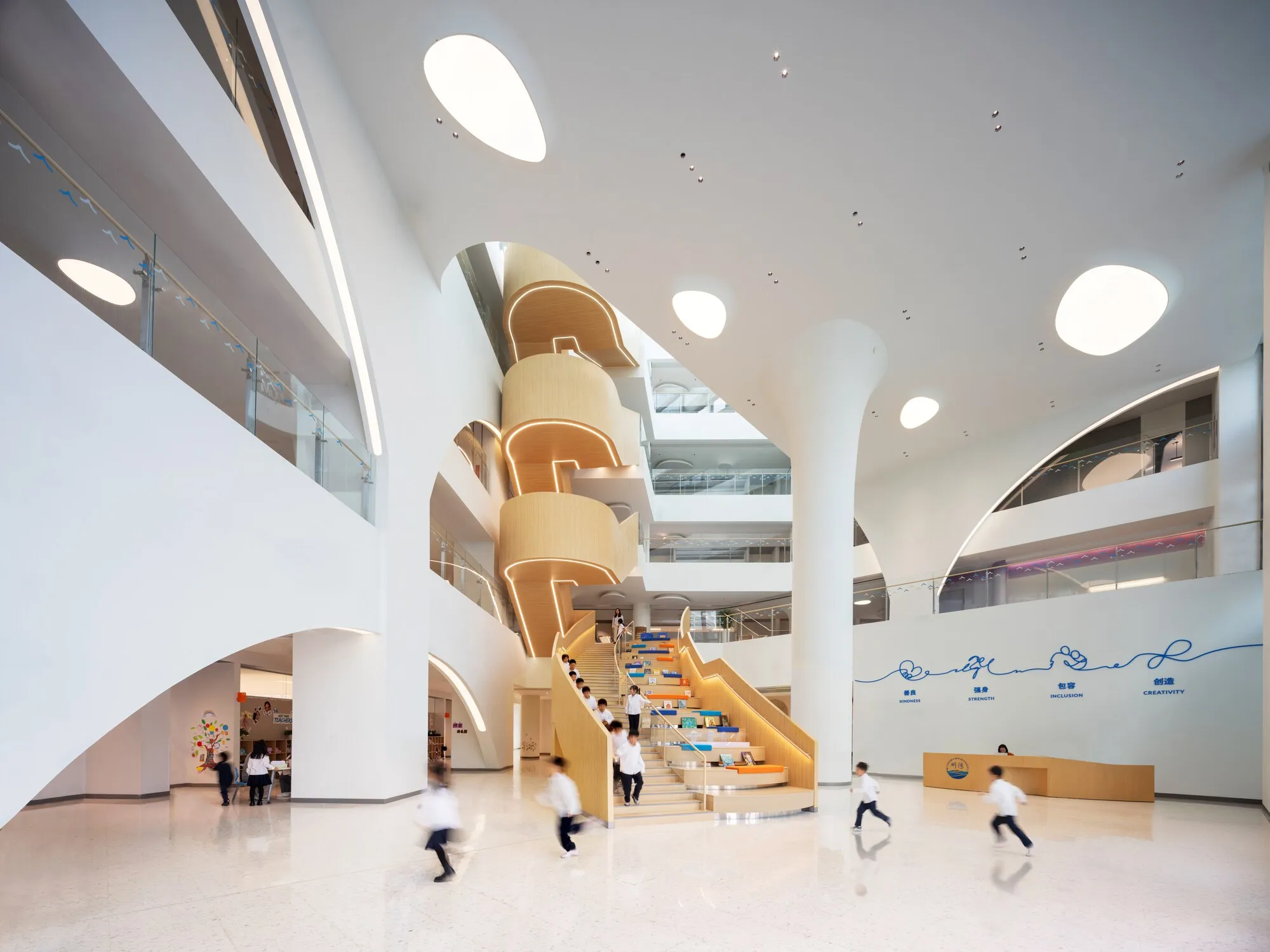 Perkins&Will Arranges a Shenzhen School in Triangular Clover Modules on a Waterfront Campus
