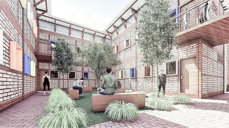 Inner courtyard blends seating, greenery, and vernacular brick architecture.