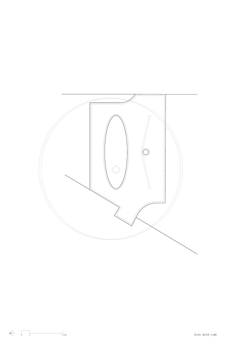 Floor plan drawing showing a bathroom with oval tub and angled entry corridor
