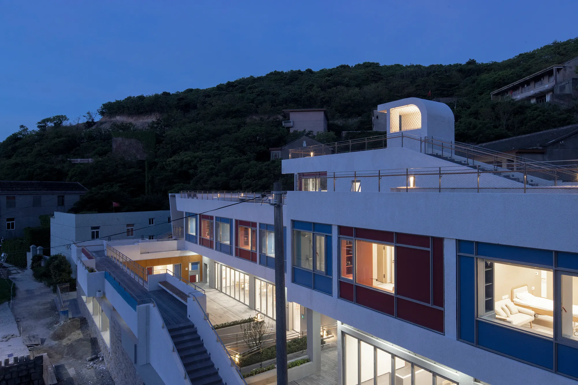 line+ studio Converts an Abandoned Island School into a Floating Care Home for 96 Elderly Residents