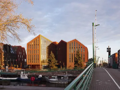 AEXN Architects Revive Klaipėda's Derelict Docks with a Gabled Terracotta Business Quarter