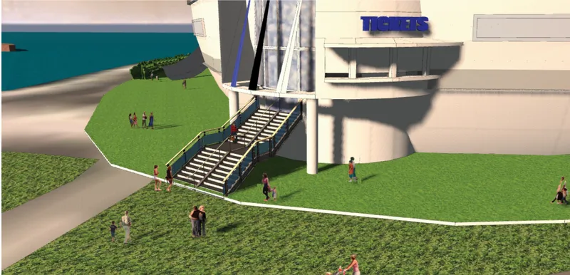 Wide staircase entry ascending to the building entrance with visitors on the grassy site and waterfront beyond