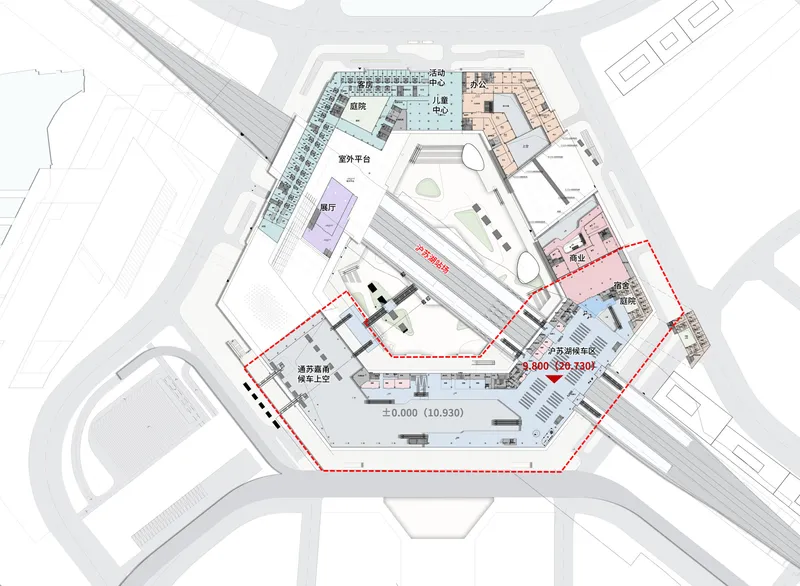 Floor plan drawing showing a hexagonal complex with color-coded zones surrounding a central courtyard with aircraft runway
